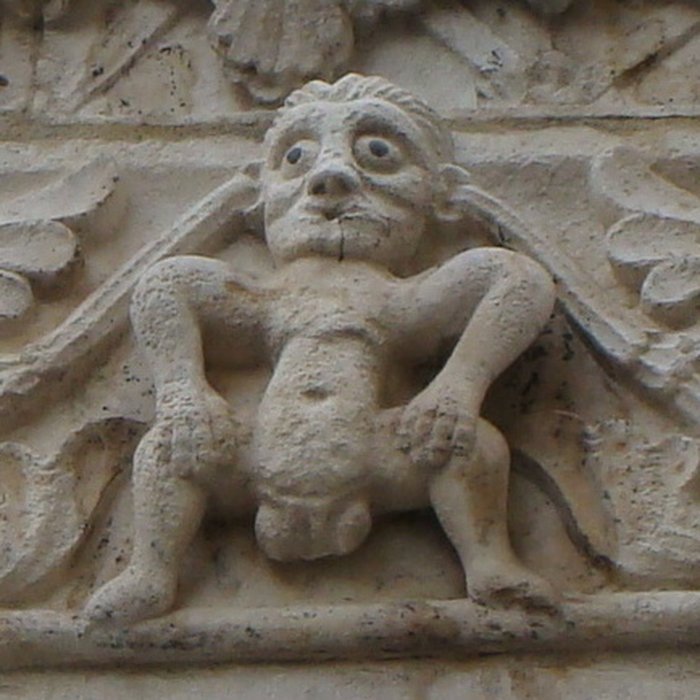 Photo de Maison romane, 1 Rue de la Madeleine à Nîmes