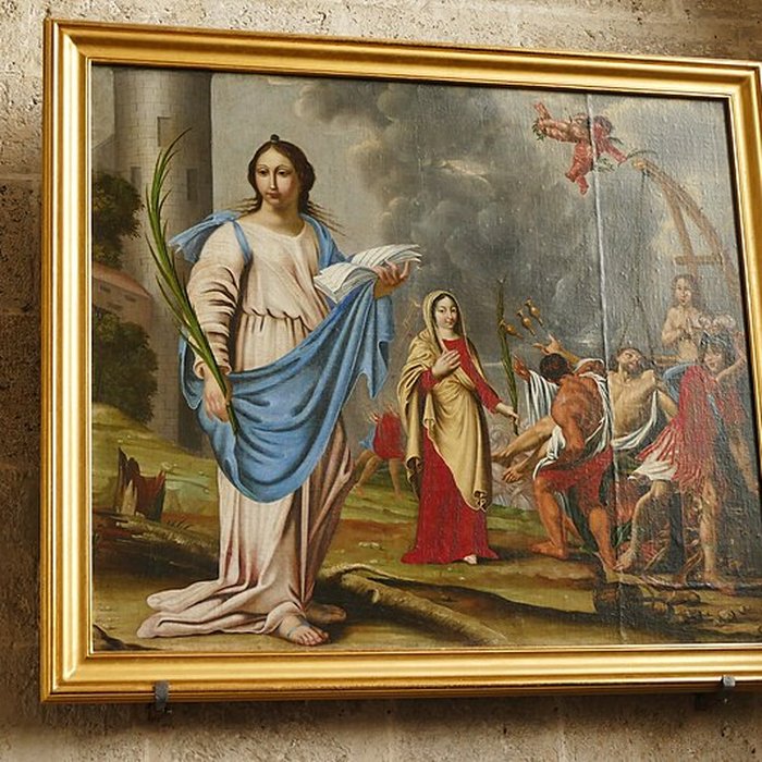 Photo de Église Saint-Martin de Beaune-la-Rolande et une croix