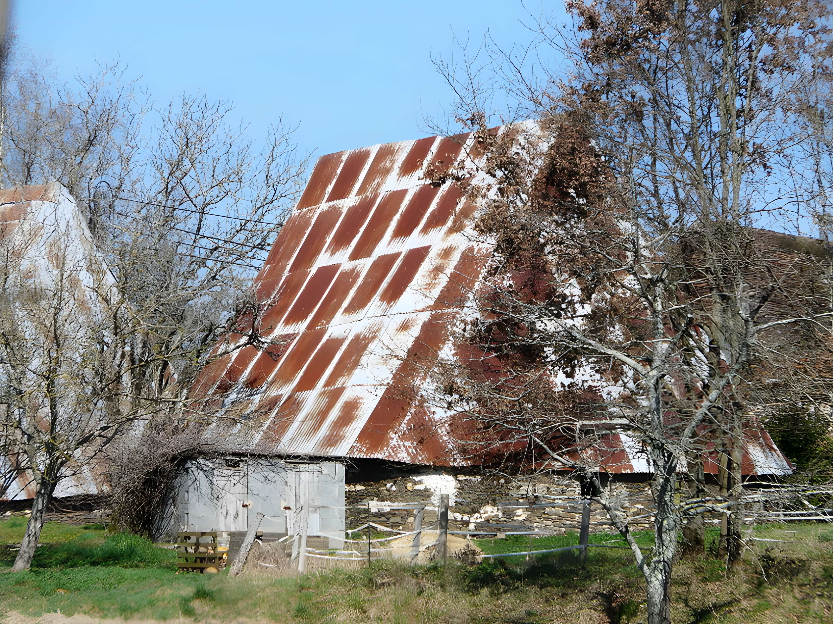 Granges ovales jumelles de Vaux à Payzac