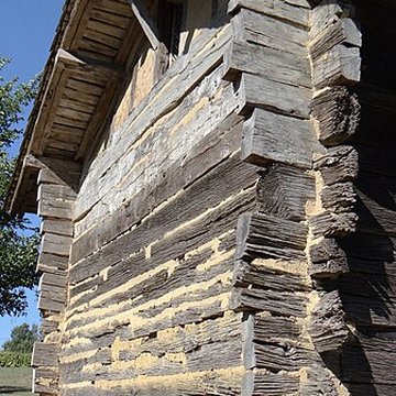 Maison à empilage de planches de Jouandis