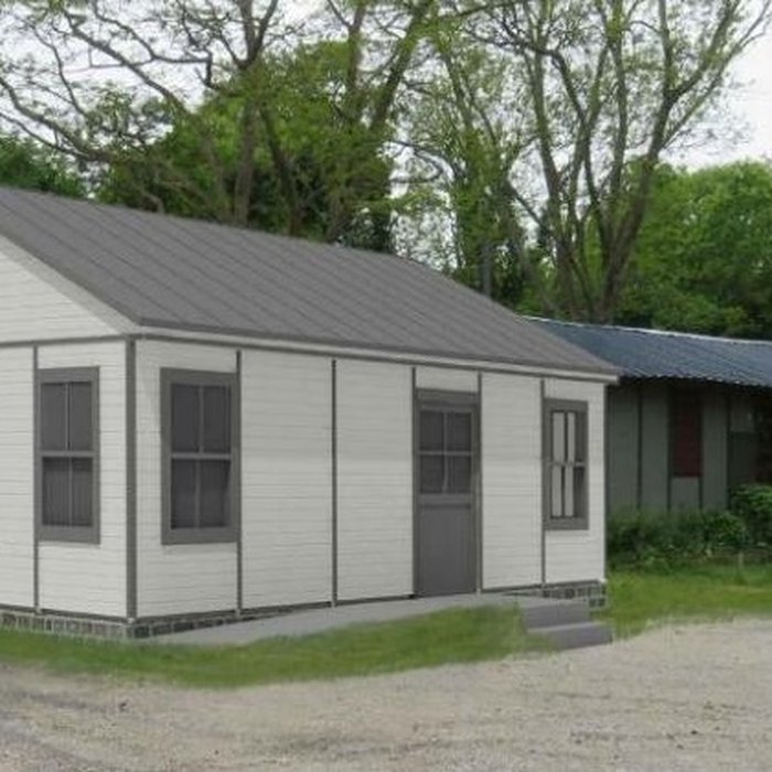 Photo de Baraque de type canadien implantée dans la cité de lhabitat provisoire de Soye