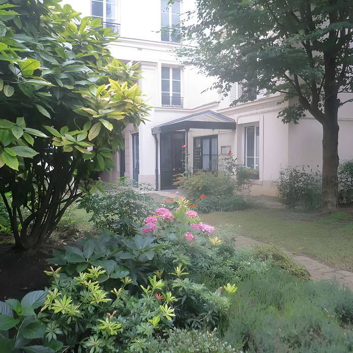Photo de Hôtel, au fond du jardin