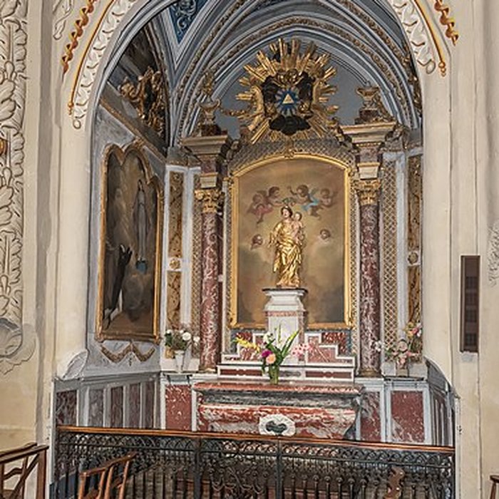 Photo de Église Saint-Rémy de Lautrec et une croix
